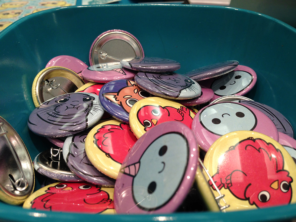 The buttons Megan sells at comic cons